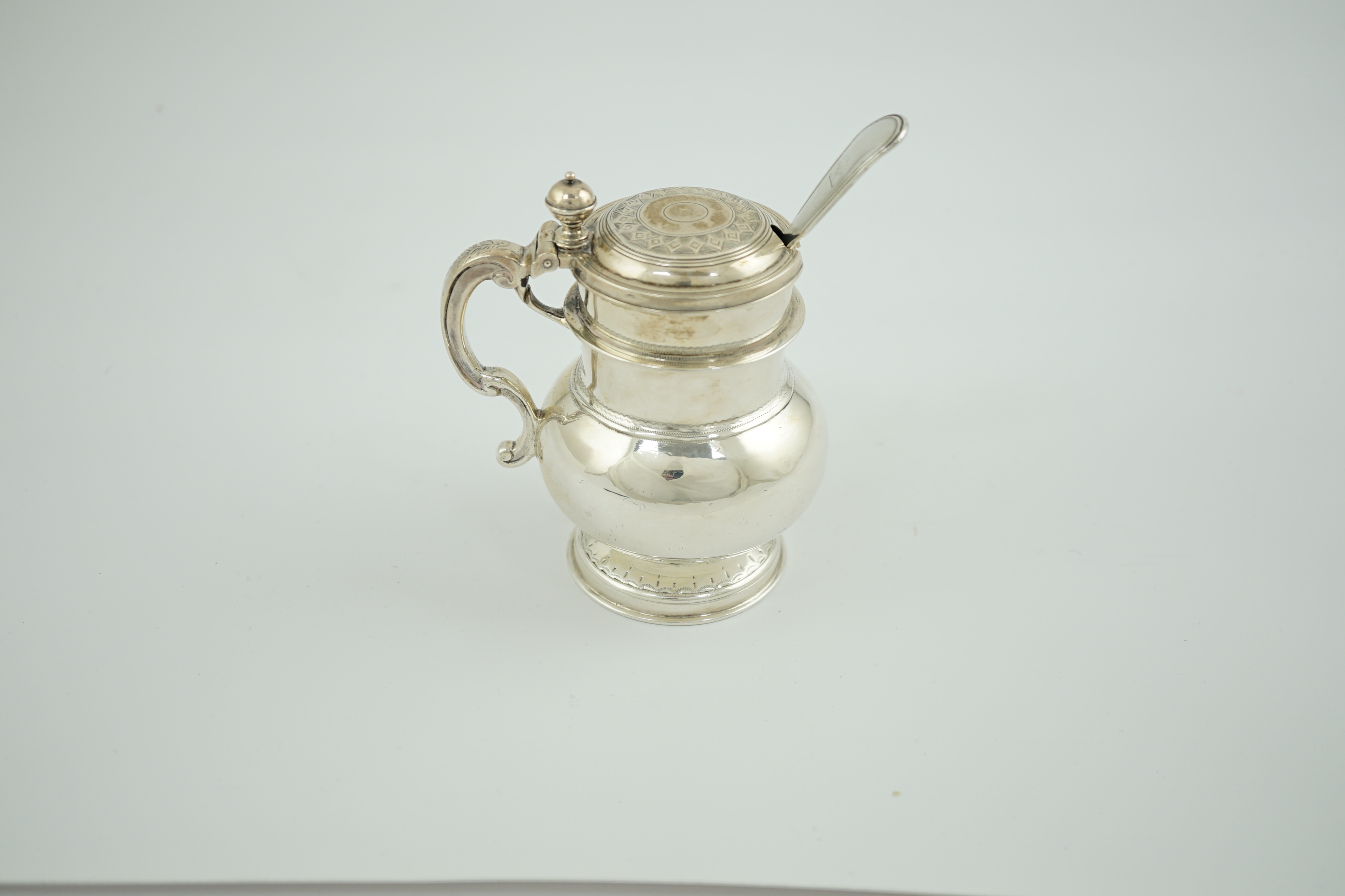 A Victorian silver bulbous mustard pot by Charles Thomas Fox & George Fox